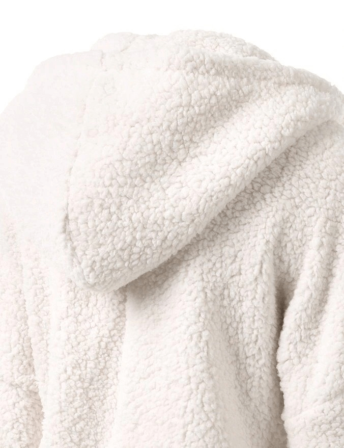 Cozy women's fleece hoodie with soft texture, perfect for cold winter nights. Casual zip-up style with hood and cotton-polyester blend.